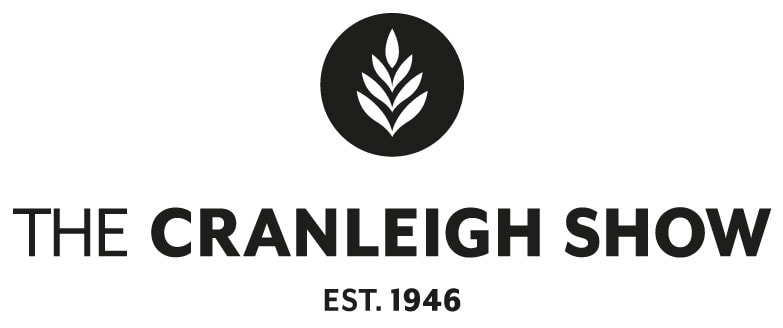 Logo for the Cranleigh Show. A simple logo in black with bold text and the icon of a wheat ears.